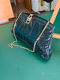 Pochette elegante vintage in pitone nera