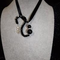 ciondolo a forma di gatto