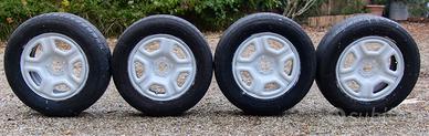 4 cerchioni + gomme 215/65 16"