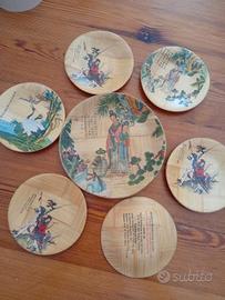 Piatti decorativi cinesi in bambu lavorato e dipin