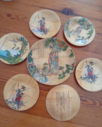 Piatti decorativi cinesi in bambu lavorato e dipin