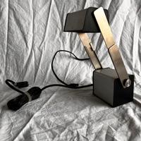 Lampada di design telescopica portatile Lightolier