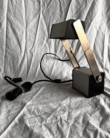 Lampada di design telescopica portatile Lightolier