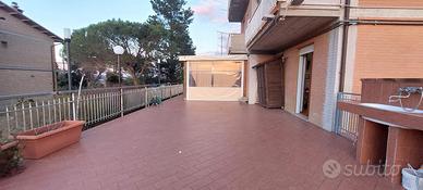 Appartamento con terrazzo e box auto