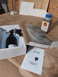 pistola e protettivo scatolati lamiera carrozzeria