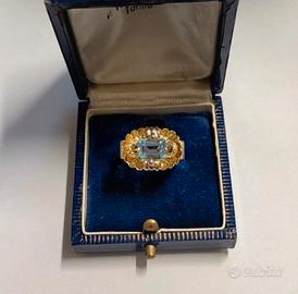 Anello oro 18kt con topazio