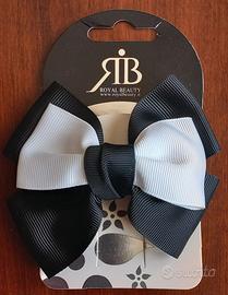 Fermaglio con fiocco bianco e nero