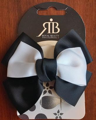 Fermaglio con fiocco bianco e nero