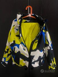 Sci/scarponi e tuta bambino/a.