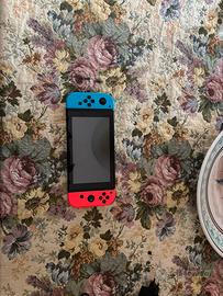 Nintendo switch con accessori + covere