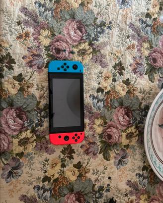 Nintendo switch con accessori + covere