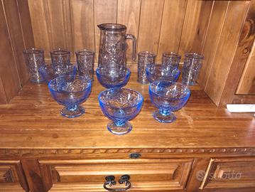 Set per 6: 6 bicchieri e 6 contenitori + caraffa. 