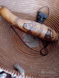 Antica corbula con zucca e maschera