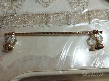 Asta per asciugamano oro