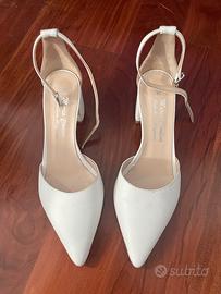 Scarpe bianche con tacco