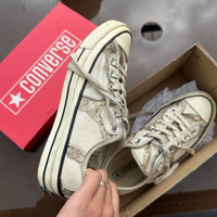 Converse white sneakers, with golden sparkling det