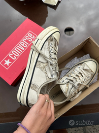 Converse white sneakers, with golden sparkling det