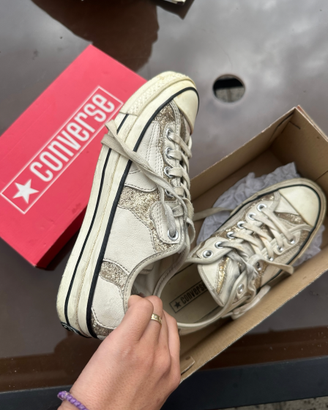 Converse white sneakers, with golden sparkling det