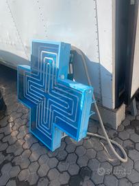 Insegna luminosa ex croce azzura