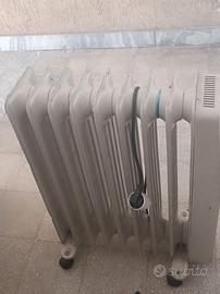 Radiatore elettrico a olio OMAS 1500W – 8 elementi