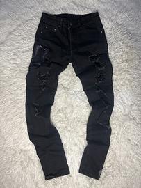 Jeans skinny nero con cobra