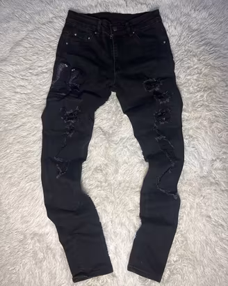 Jeans skinny nero con cobra