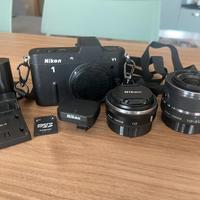 Nikon 1 V1 + 10mm + 10-30mm zoom + gps