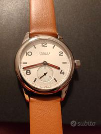 NOMOS Club 703