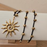 collana con ciondolo sole nera oro