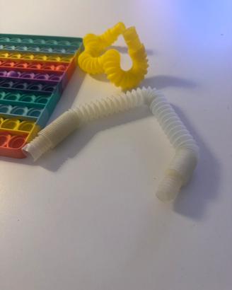 Giochi sensoriali Pop it + 2 tubi estensibili