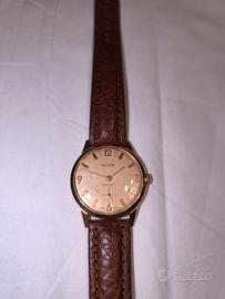 Orologio Invicta con guscio in oro 18k