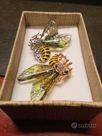 Spille a forma di vespa