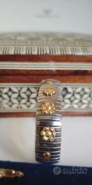 Bracciale elastico in acciaio e inserti oro 18 Kt