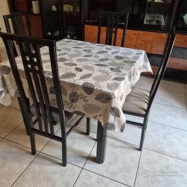 regalasi sala con armadio tavolo sedie e divano