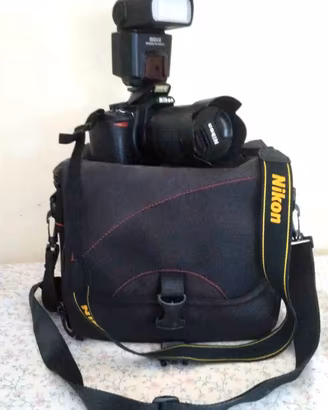 Fotocamera Nikon D3100 - Telecamera Sony D-25