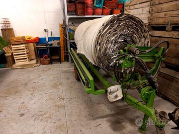 avvolgitore agricolo con teli riflettenti