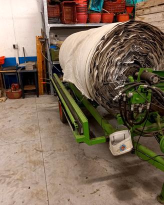 avvolgitore agricolo con teli riflettenti