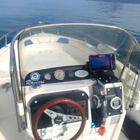 Open 575 con rimorchio