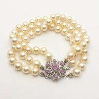 Bracciale perle chiusura oro 18KT con rubini, 1950