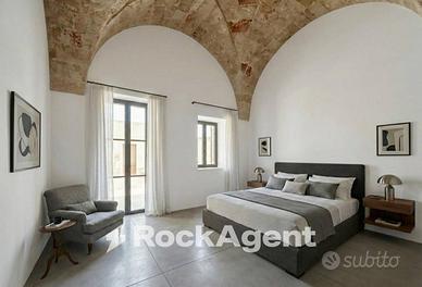 FABBRICATO RESIDENZIALE A RUSTICO IN CORSO DI COMP