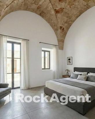 FABBRICATO RESIDENZIALE A RUSTICO IN CORSO DI COMP