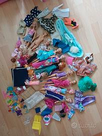 barbie 10 +4 bambole più accessori e vestitini