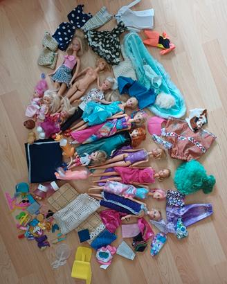 barbie 10 +4 bambole più accessori e vestitini