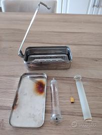 siringa in vetro con bollitore