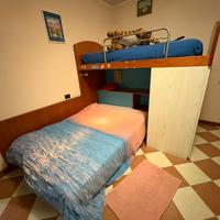 Camera da letto doppia/tripla in legno