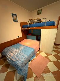 Camera da letto doppia/tripla in legno