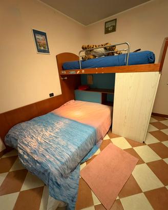 Camera da letto doppia/tripla in legno