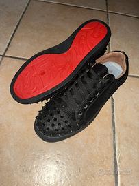 Scarpe con suola rossa