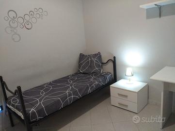 due letti singoli e a castello 