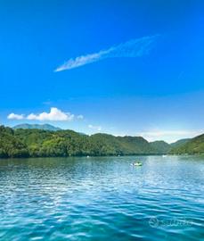 Vacanza al lago di Levico, bilocale con giardino